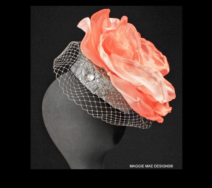 Coral and silver cocktail hat for Royal Ascot races