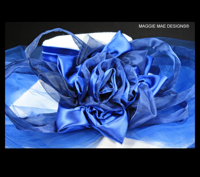 Royal blue rose trimmed wide brim silk hat