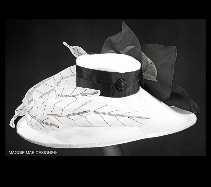 white silk garden party hat with black and white Marguerite 