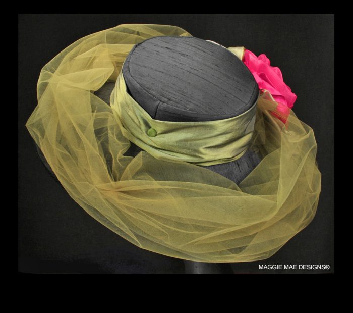 Black silk wide brim hat with coral rose and olive green tulle