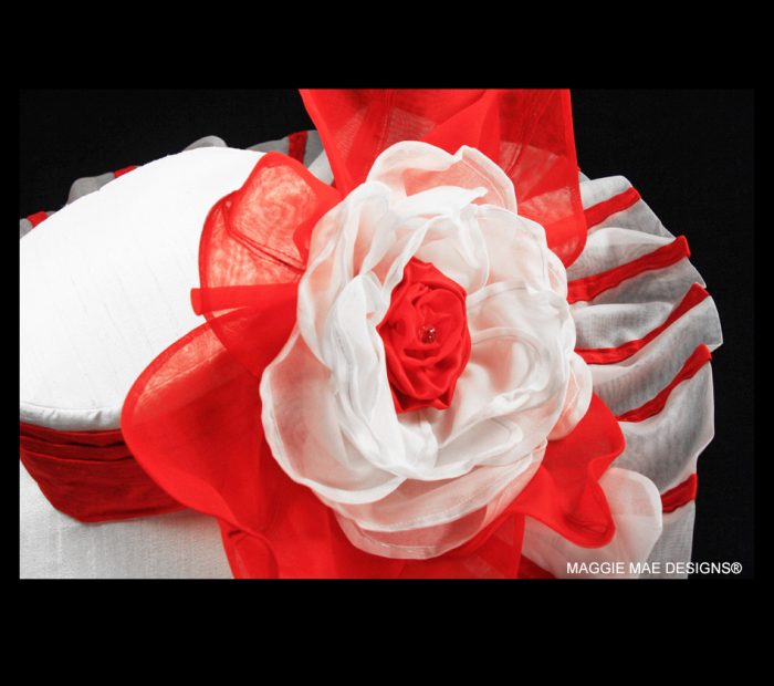 Red and white silk wide brim hats for the Kentucky Derby