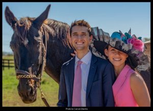 The "Cozmic One" hat created for "Hats Off to the Horses"2026. Andie Biancone and Keith Assmussen, modeling. Photo by Carson Blevins