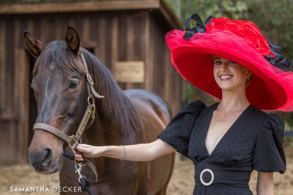 Acacia Clement modeling the “A Shin Forward” hat with A Shin Forward at Old Friends at Cabin Creek