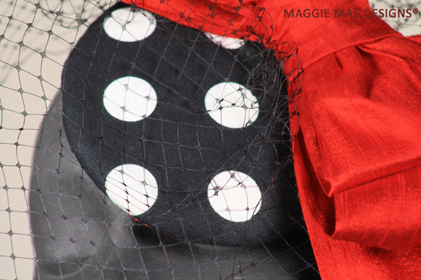 The Minnie polka dot fascinator with black veiling
